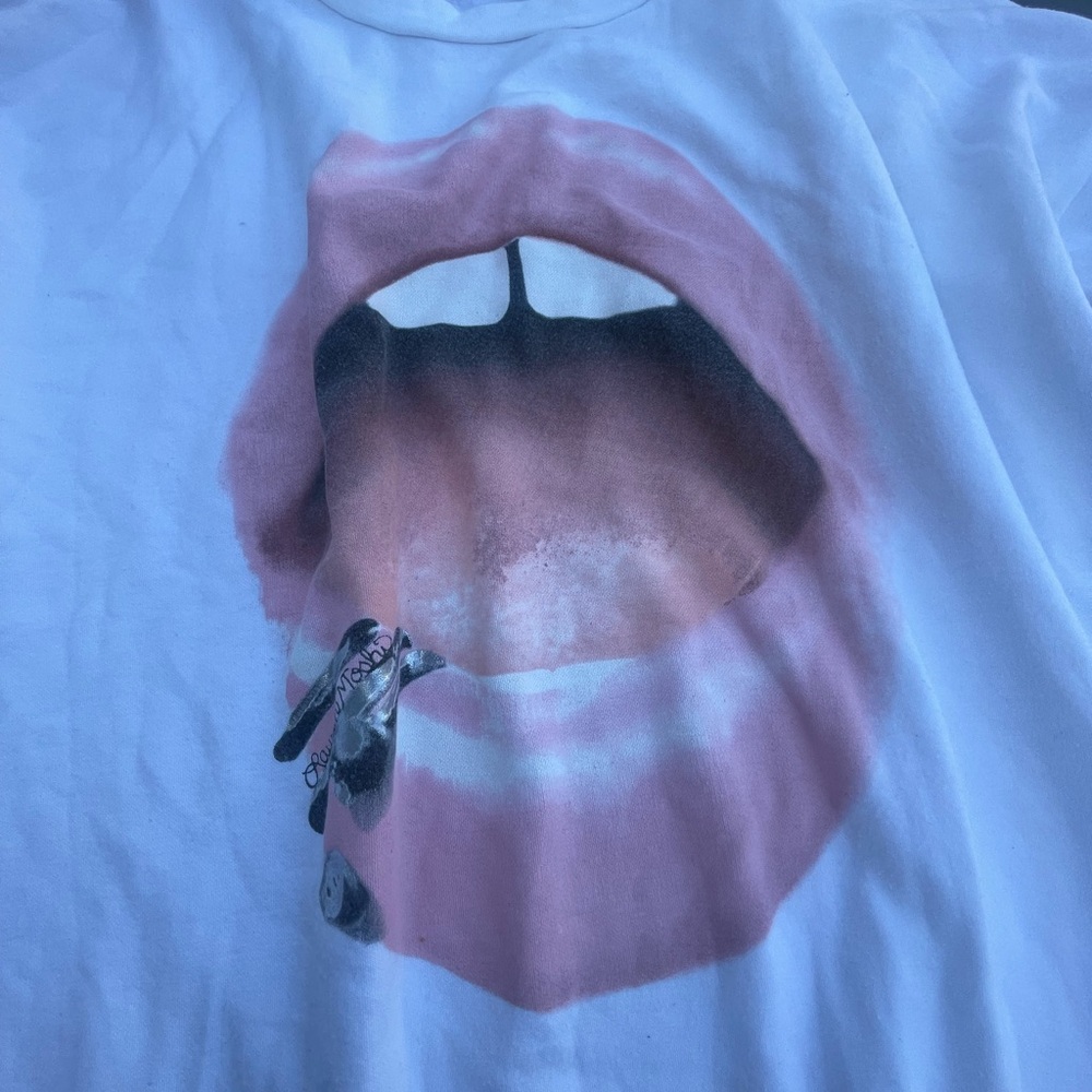super cute thin material crewneck. with lips. white base and long sleeves